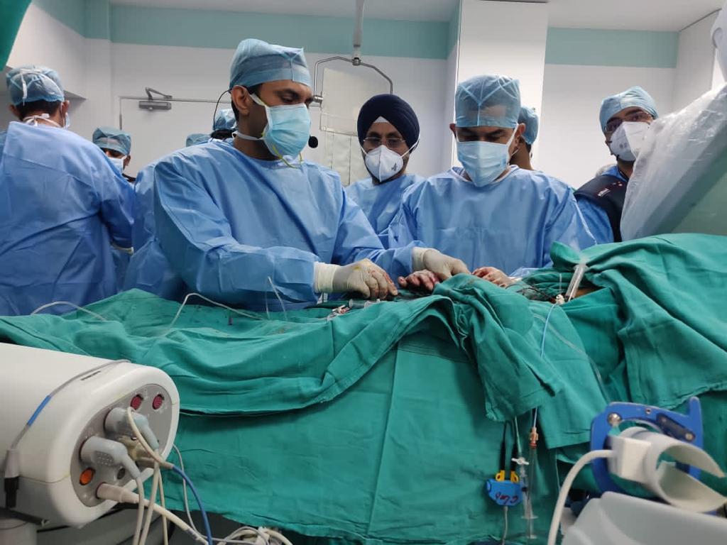 Dr. Ravinder Singh Rao performing heart surgery